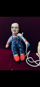 lot 1240 image: Chucky Doll and Mask Lot with Rope