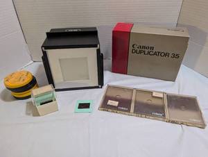 lot 3109 image: Cokin Filters, Canon slide duplicator and Omega D-B light mixing chamber