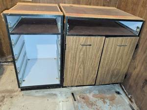 lot 3143 image: 35x49x23 overall measurement on both pieces. Particle board storage located in basement