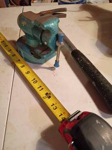 lot 3320 image: Small Vise and a Hammer
