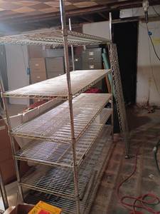 lot 3343 image: Wire Shelves.  Located in basement.  74 x 59 x 24.   Comes with extra shelf and poles.  Winner of this item will need to schedule a later pick up time