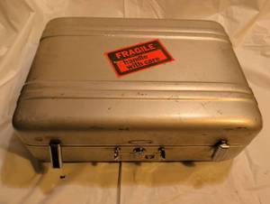 lot 3402 image: Halliburton metal case no handle no keys. 6x13x17