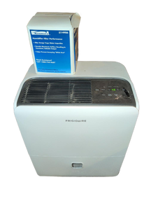 lot 3413 image: Frigidaire High Humidity 60 Pint Capacity Dehumidifier. Currently in use in the basement. Will have to be unplugged and unhooked from hose to sump pump by buyer