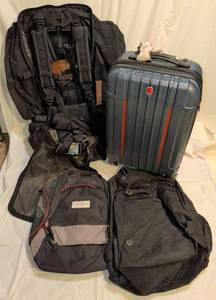 lot 3419 image: Luggage assortment with Caribou hiking backpack, Swiss Gear rolling carry on and backpacks