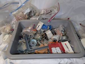 lot 3429 image: Tile spacers, door knobs, cabinet knobs, and more fasteners