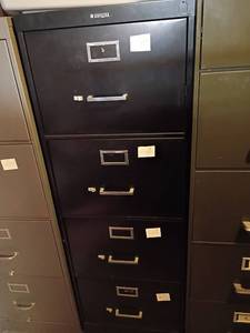 lot 3204 image: Metal Filing Cabinet.  4 Drawers.  52 x 18 x 27.   Located in basement