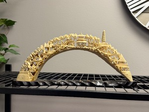 lot 1140 image: Asian Tusk Resin Carved Village Scene Bridge  Dark With Base