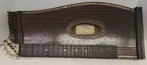 lot 1 image: Antique Early 1900s Joseph Placht Wood Zither String Instrument with Mother of Pearl Inlay & Bone Tuner Knobs - Wood Handle Tuner Tool - 24in L x  10.25in W x 2in T - Original Sticker - in Original Wood Case with Brass Handle & Hooks