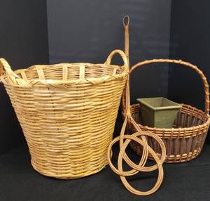 lot 50 image: Large Gathering Baskets, Wood PlanterTree Stand, and Vintage WickerRattan Rug Beater