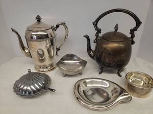 lot 53 image: Collection of Silver Plate & Stainless Steel Serving Pieces Coffee Pot, Tea Pot, Strainer, Footed Candy Dish, Bon-BonNut Tray, and Caviar Server with Cobalt Glass Insert