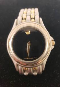 lot 57 image: Vintage Movado Mens Museum Two-Tone Quartz Wrist Watch #98A-2888 - Black Dial with Gold Accents