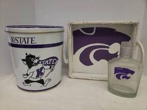 lot 62 image: Kansas State Wildcats Home Accessories Large StorageSnack Tin 11in T x 10in W, Power Cat Embellished Boubon Bottle, and Painted Wood Serving Tray with Horseshoe Handles - 13in L x 12in W