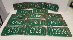 lot 67 image: Vintage 1975 Metal KANAS Trailer License Tags - 14 Total