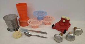 lot 83 image: Vintage Kitchen Collectibles Mower SaltPepper Set missing parts, Celluloid Nut Cups, Laundry Bottle Springler Cork Tops, Baby Spoons, a Collapsible Travel Cups