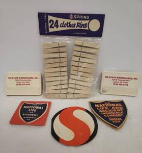 lot 84 image: Vintage Advertising Sewing Needle Folders Safeway & National Life Insurance, Advertising Retracting Measuring Tapes, and Package of Old Wood Clothes Pins