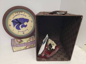 lot 151 image: NWT Woven Storage Basket with Metal Frame 11in W x 15in L x 11in T, Battery Operated 11.5in Round Kansas State Wildcats Clock, Dresser Box, and Rowenta Travel Iron - European Plug with Adapter