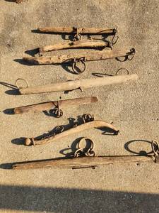 lot 73 image: Lot of Antique Wooden Horse Harnesses Primitve Farm Decor&nbsp