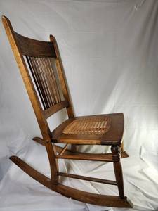 lot 76 image: Antique Solid Oak Rocking Chair Caned Seat Carved Oak Leaf Back Early 20th Century&nbsp