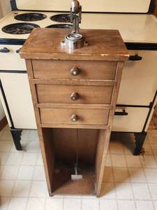 lot 83 image: Antique Foot Powered Riveting Machine with Wooden Cabinet &amp Rivet Dies