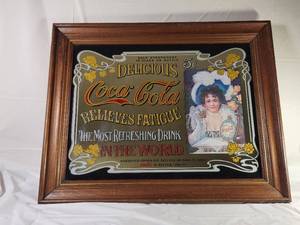 lot 103 image: Vintage 1970s Coca-Cola Relieves Fatigue Framed Mirror&nbsp