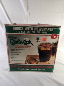 lot 180 image: Safari Omni-Cook Alternative Fuel Cooker Newspaper