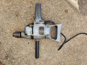 lot 213 image: Corded Electric Rotary Hammer Drill with Handle Works