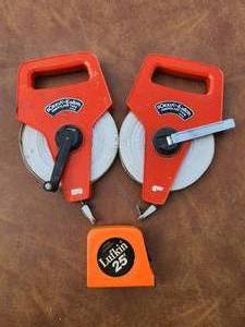 lot 250 image: Pair of Sokkia Fiberglass Reels and One Measuring Tape