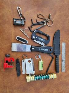 lot 271 image: Outdoor Tool Lot Knives, Hose Saver, Level and Accessories, Pipe Cutter, and More