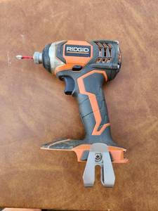 lot 279 image: RIDGID Cordless Impact Driver Model CS122930150443