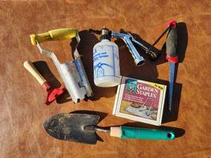 lot 315 image: Garden Tools Lot 7 Piece Set Shovel Sprayer Staples Saw