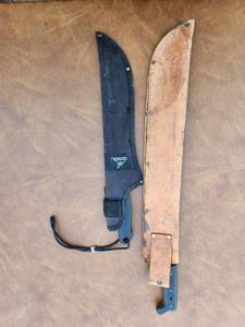 lot 321 image: Pair of Machetes With Sheaths