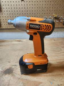 lot 404 image: RIDGID 18.0V Cordless Impact Wrench R842301 with MAX Battery