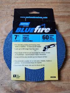 lot 446 image: Norton BLUEfire 7 inch Flap Disc 60 Coarse 58-11 03206 New
