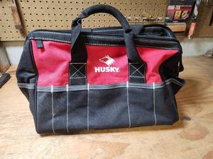 lot 463 image: Husky Tool Bag with Assorted Hand Tools and Sockets