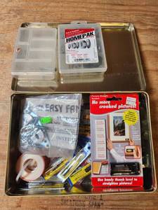 lot 485 image: Hardware and Home Improvement Supply Lot Picture Straight Leveler HOMEPAK Nuts and More