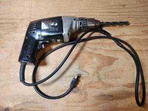 lot 497 image: Model 0002B Corded Electric Drill 115V AC Works