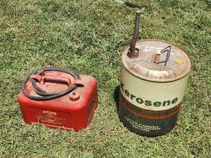 lot 706 image: Pair of Vintage Gas Cans Wizard Outboard Motor Gas Tank and Kerosene Tank