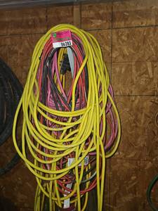 lot 6283 image: Multiple Yellow and Red Extension Cords.