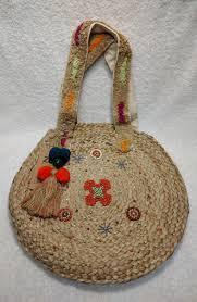 lot 61813 image: ZOI round jute shoulder bag