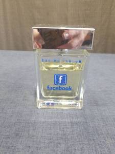 lot 1916 image: Facebook Eau de Parfum Natural Spray Partially Full