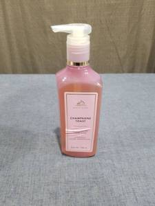 lot 2133 image: White Barn Champagne Toast Cleansing Gel Hand Soap 8 fl oz