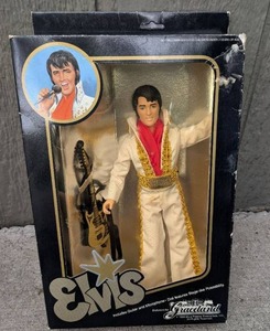 lot 560 image: Elvis Presley Enterprises 1984 Elvis Action Figure with Guitar and Microphone