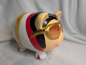 lot 565 image: Elvis Presley Large Ceramic Piggy Bank with Sunglasses Striped Body
