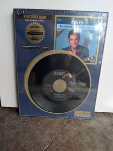 lot 1003 image: RCA Elvis Presley Kentucky Rain Gold Standard Platinum Record 447-0675