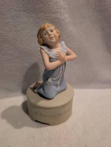 lot 1501 image: Figurine Kneeling Child Blue Gown Music Box