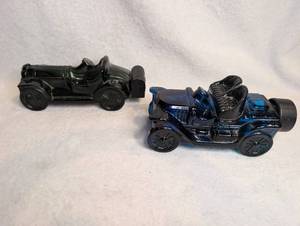 lot 1605 image: Lot of 2 Toy Race Cars and 2 Avon Bottles