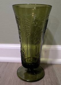 lot 3501 image: Vintage Indiana Green Glass Vase with Grape Cluster Relief Design Pedestal Base