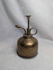lot 4005 image: Vintage Brass Pump Sprayer Bottle&nbsp