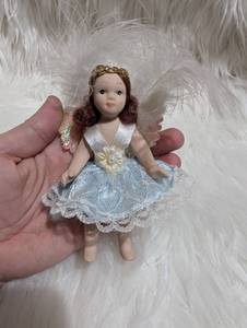 lot 4620 image: Florence Maranuk Cereamic Angel Doll with Wings Gold Crown Blue Lace Dress