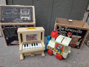 lot 6103 image: Vintage Tuneyville Player Piano with Tuneyville Choo-Choo Toy